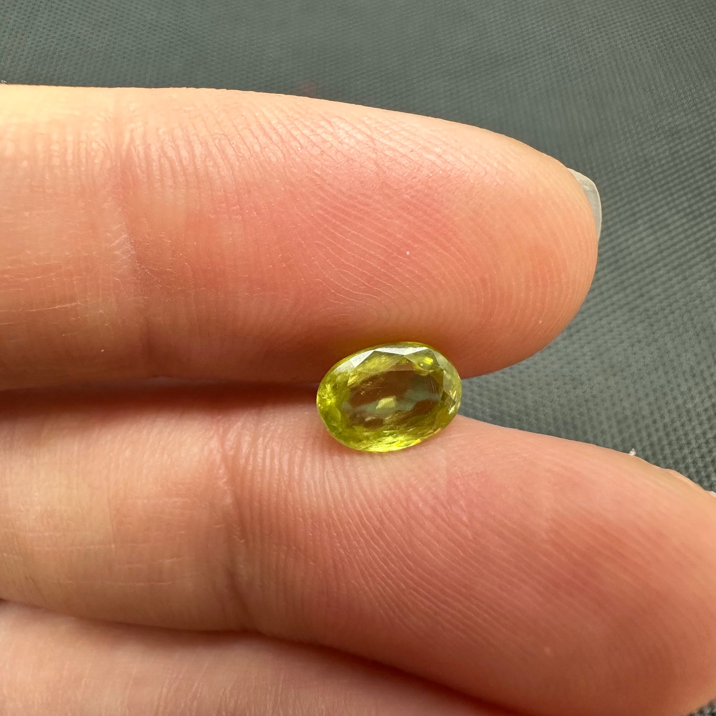 1.11 carat Yellowish Green Sphene 7.3x5.3mm Oval Cut, Natural Madagascar Sphene, Faceted Loose Vivid Green Titanite