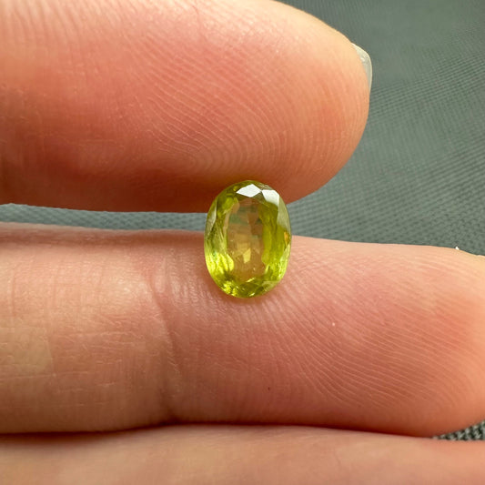 1.11 carat Yellowish Green Sphene 7.3x5.3mm Oval Cut, Natural Madagascar Sphene, Faceted Loose Vivid Green Titanite