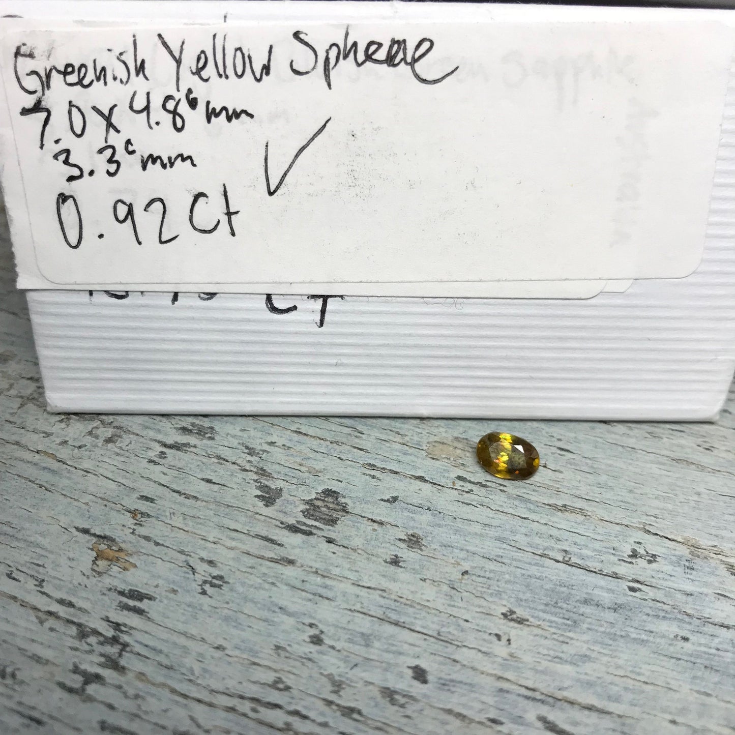 7x5mm Yellow Sphene Oval Cut, 0.92 Carat Natural Orangish Yellow Sphene with Rainbow Flashes