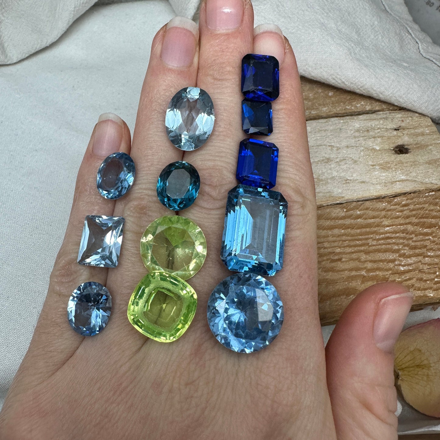 116 carat Lot of Lab Created Spinel 12 stones, Discounted Worn, Faceted, Recycled, Chipped, Damaged Gemstones, Blue and Yellow Green