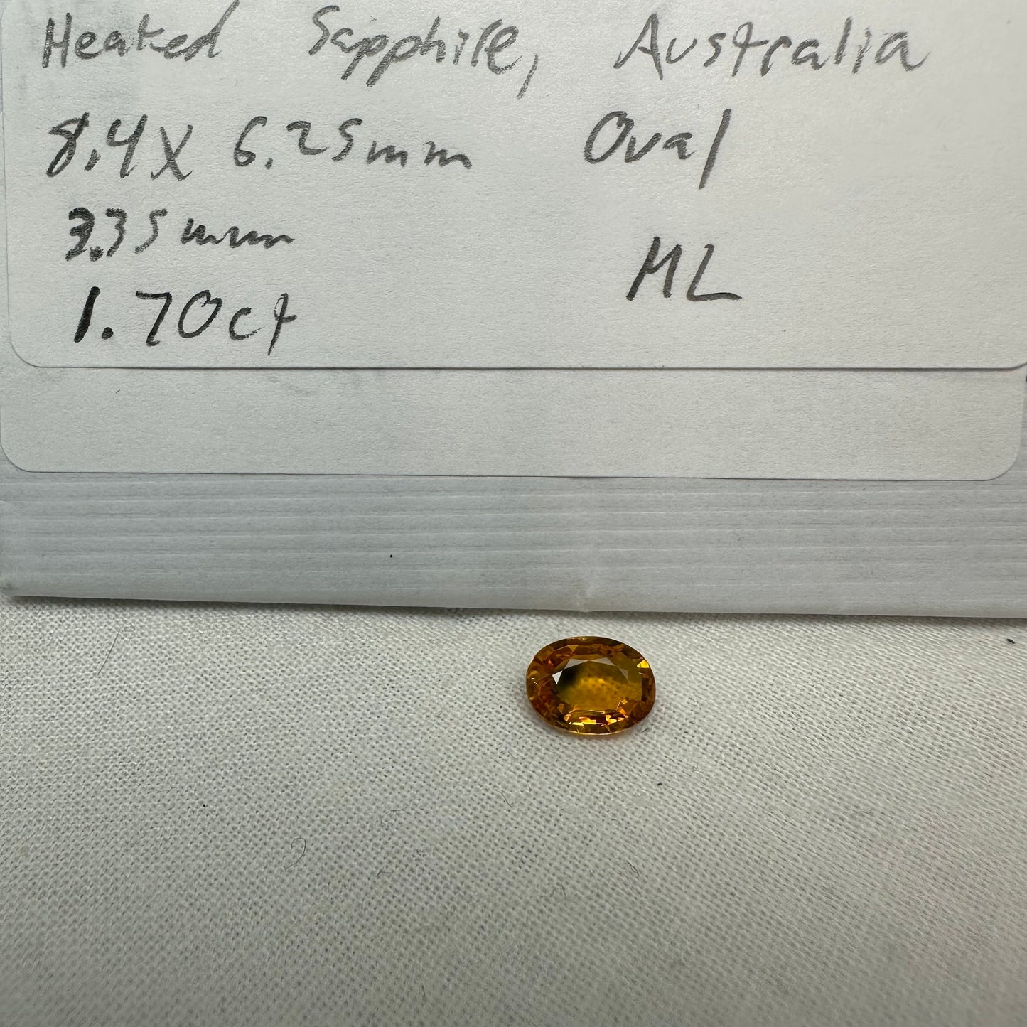 1.7 Carat Sapphire 8.4x6.25mm Oval Cut, Heat Treated, Yellow Orange, Faceted Loose Australian Sapphire