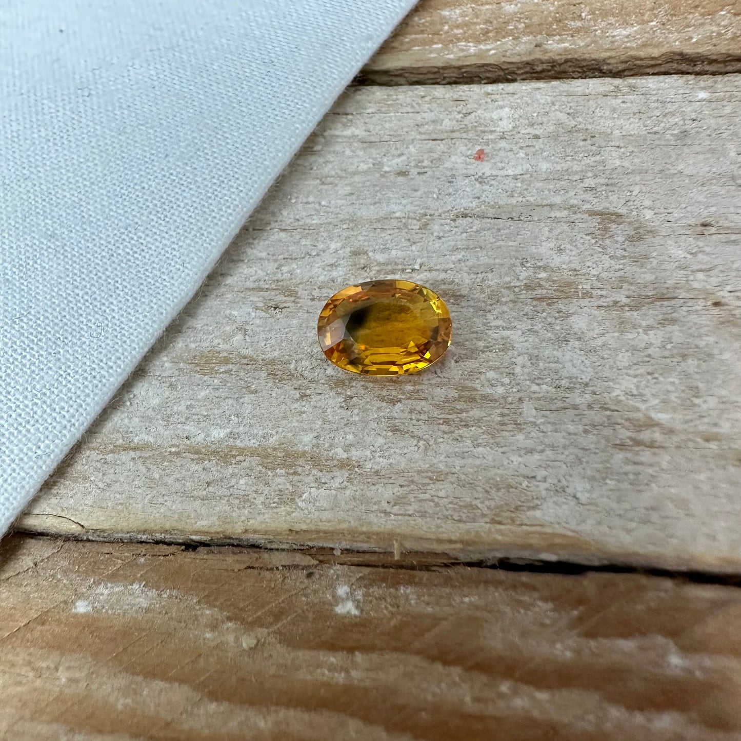 1.7 Carat Sapphire 8.4x6.25mm Oval Cut, Heat Treated, Yellow Orange, Faceted Loose Australian Sapphire