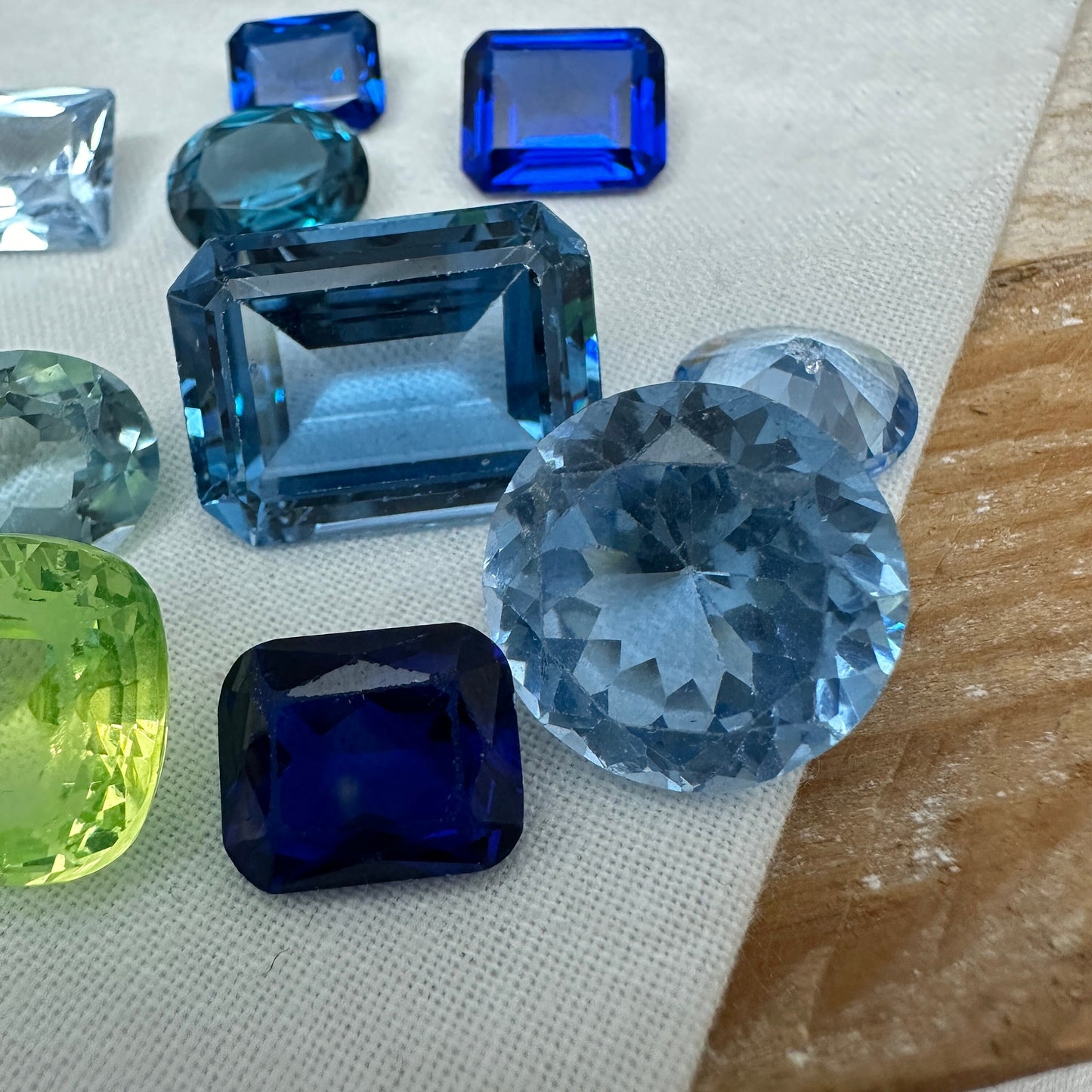 116 carat Lot of Lab Created Spinel 12 stones, Discounted Worn, Faceted, Recycled, Chipped, Damaged Gemstones, Blue and Yellow Green