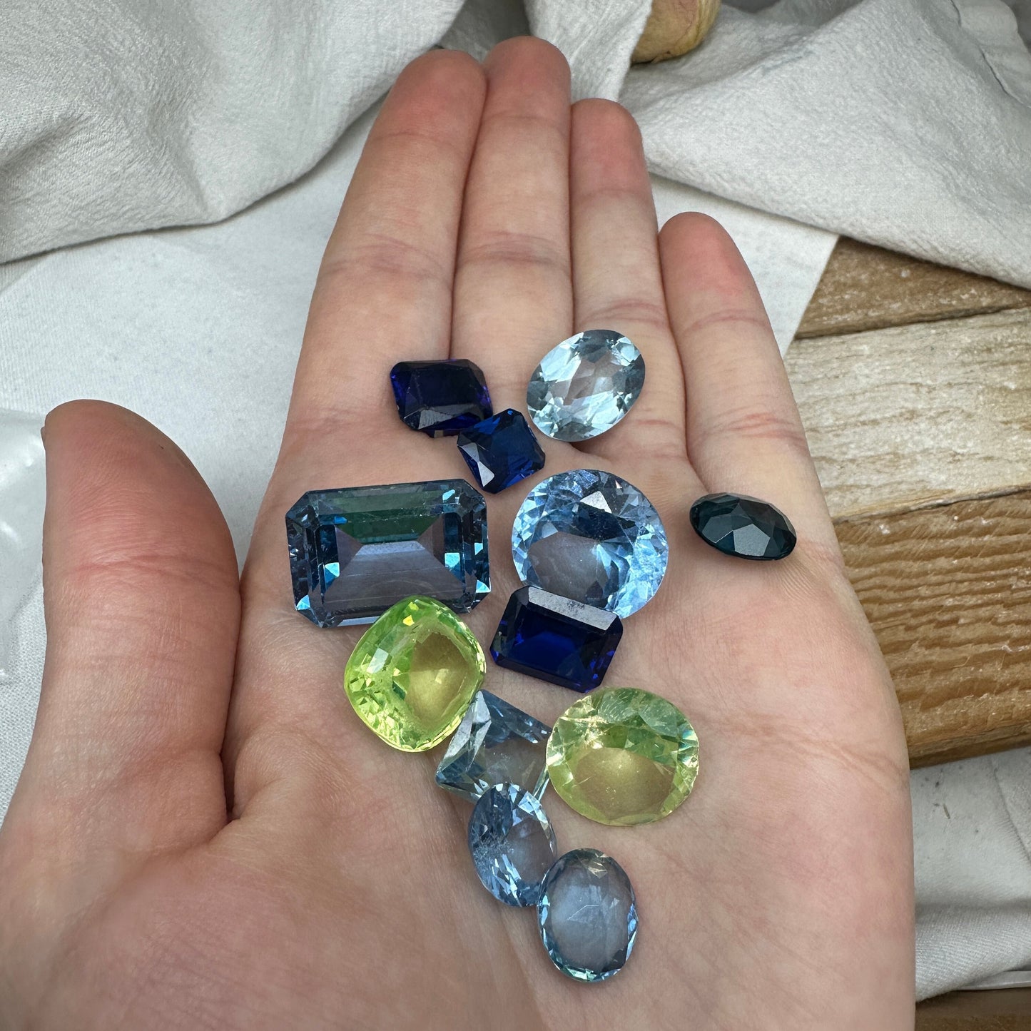 116 carat Lot of Lab Created Spinel 12 stones, Discounted Worn, Faceted, Recycled, Chipped, Damaged Gemstones, Blue and Yellow Green