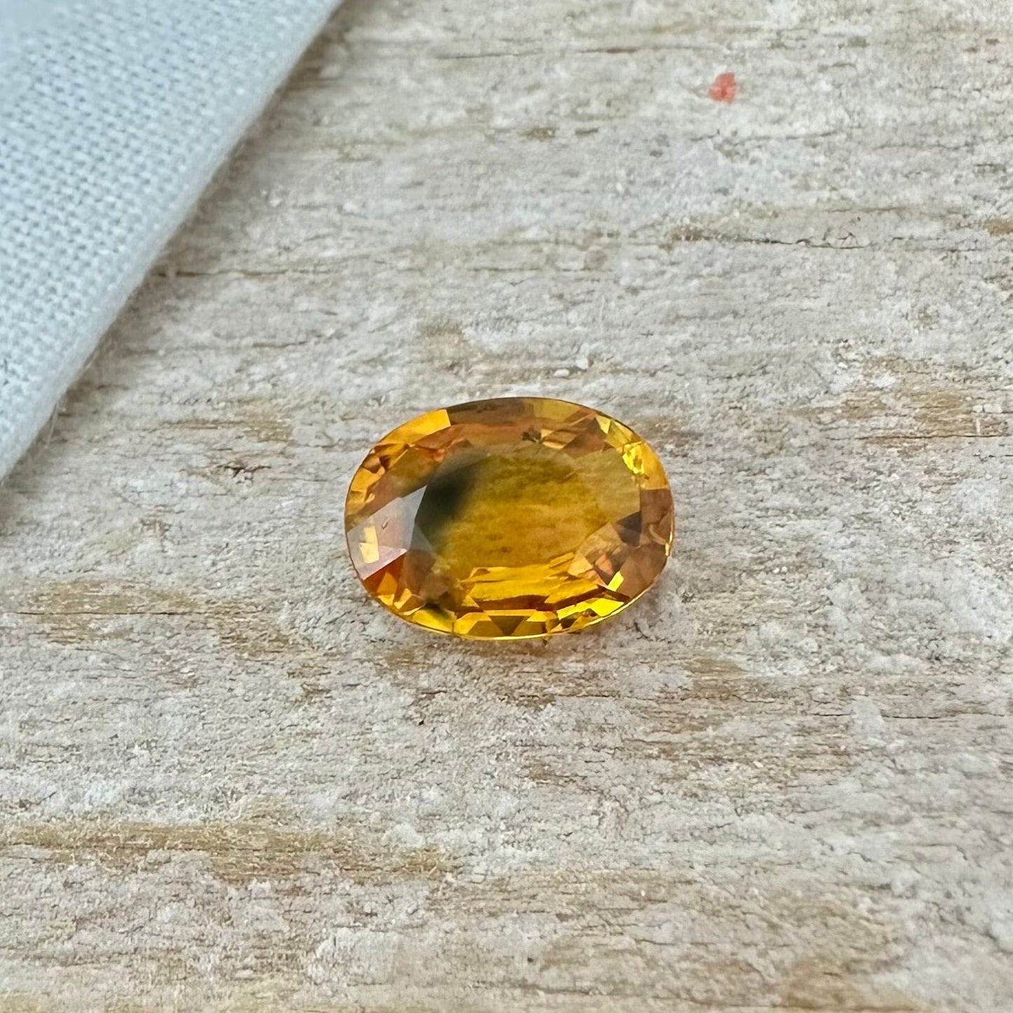 1.7 Carat Sapphire 8.4x6.25mm Oval Cut, Heat Treated, Yellow Orange, Faceted Loose Australian Sapphire