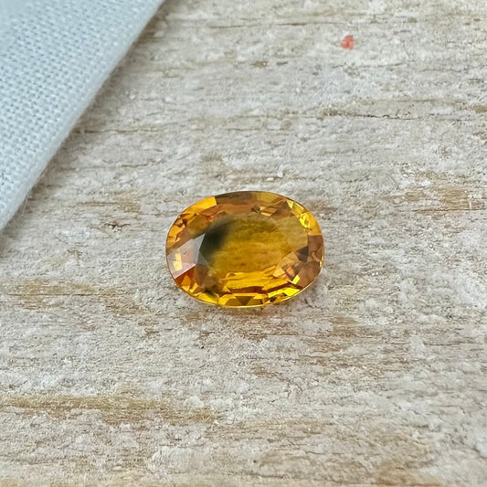 1.7 Carat Sapphire 8.4x6.25mm Oval Cut, Heat Treated, Yellow Orange, Faceted Loose Australian Sapphire