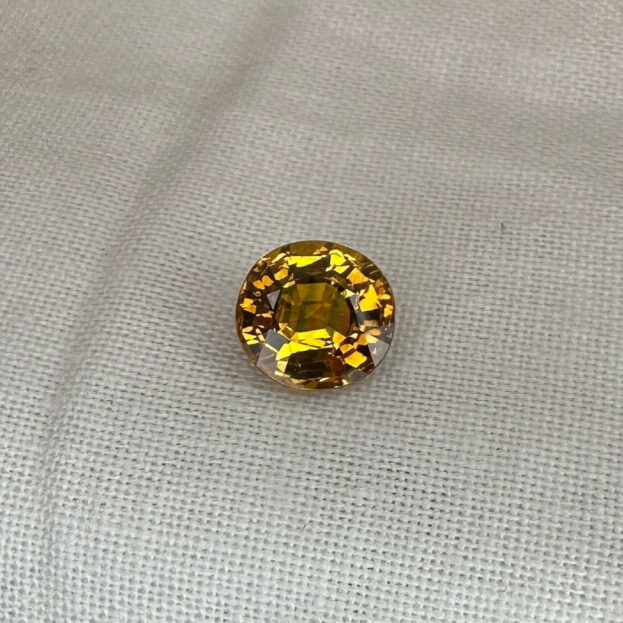 2 Carat Sapphire 7.5x7.1mm Oval Cut, Heat Treated, Yellow Orange, Faceted Loose Australian Sapphire
