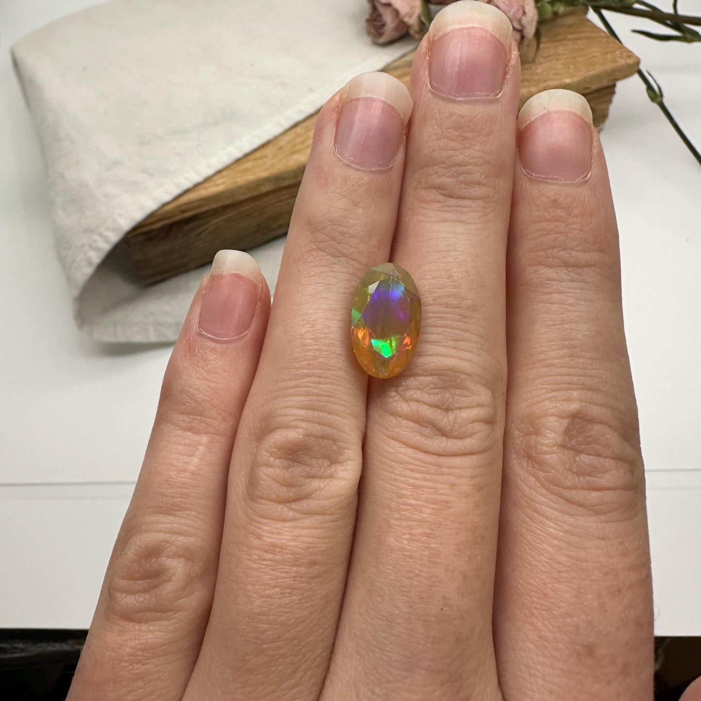 3 Carat Ethiopian Opal 14.65x8.6mm Oval Cut, Faceted Loose Opal, Green Orange Yellow Blue Color Play