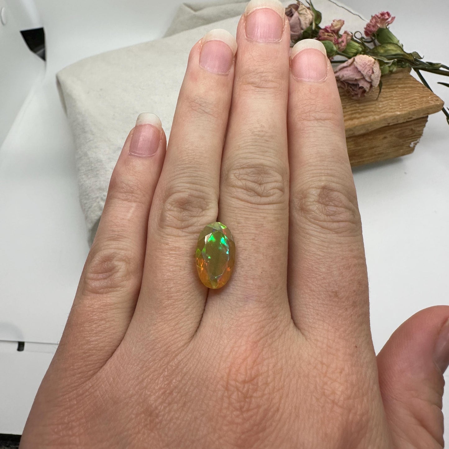 3 Carat Ethiopian Opal 14.65x8.6mm Oval Cut, Faceted Loose Opal, Green Orange Yellow Blue Color Play