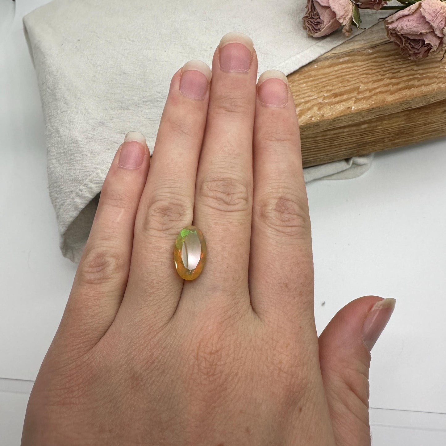 3 Carat Ethiopian Opal 14.65x8.6mm Oval Cut, Faceted Loose Opal, Green Orange Yellow Blue Color Play