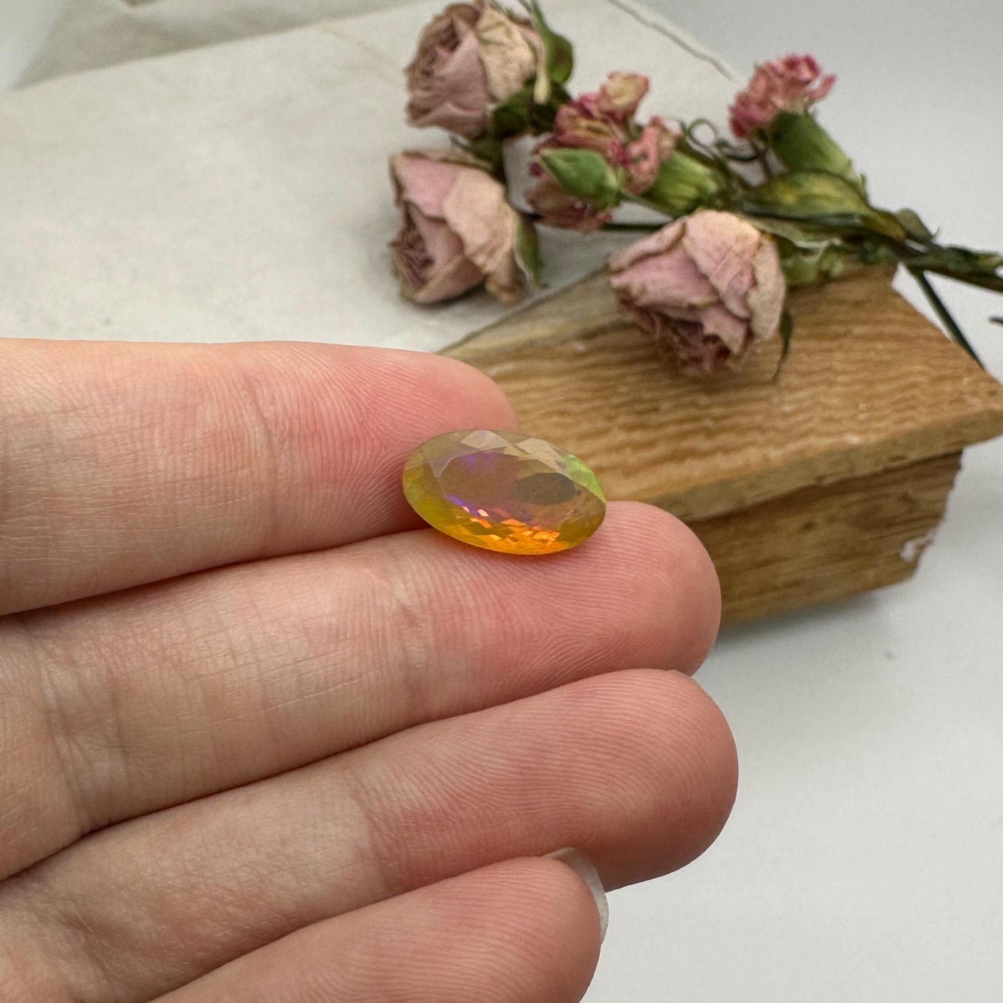 3 Carat Ethiopian Opal 14.65x8.6mm Oval Cut, Faceted Loose Opal, Green Orange Yellow Blue Color Play