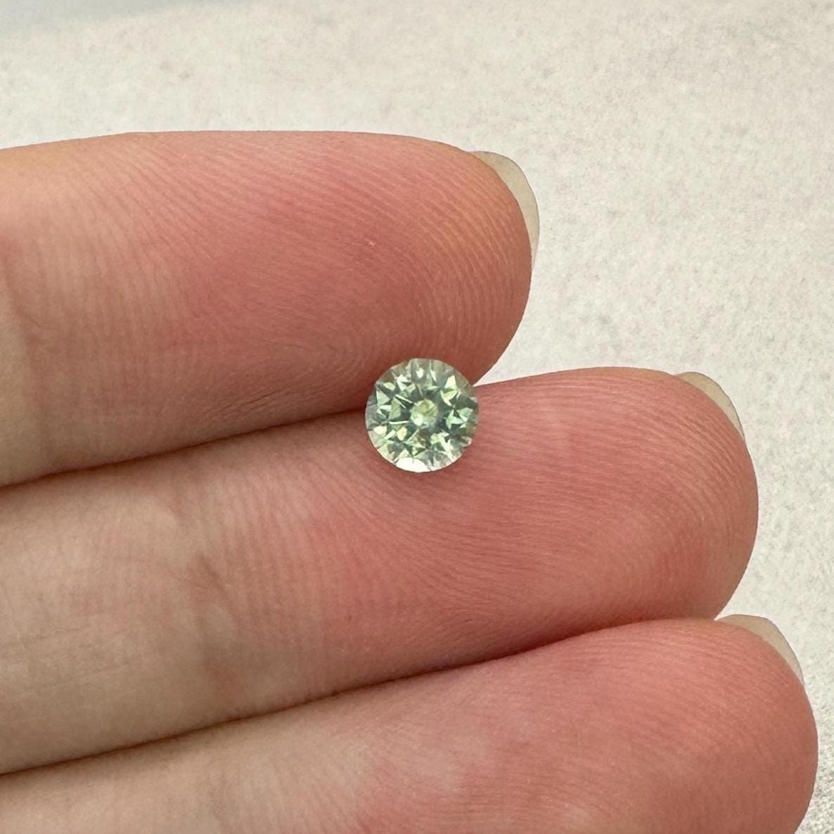0.60 Carat Greenish Yellow Montana Sapphire 5mm Round Cut, Natural Unheated Faceted Loose