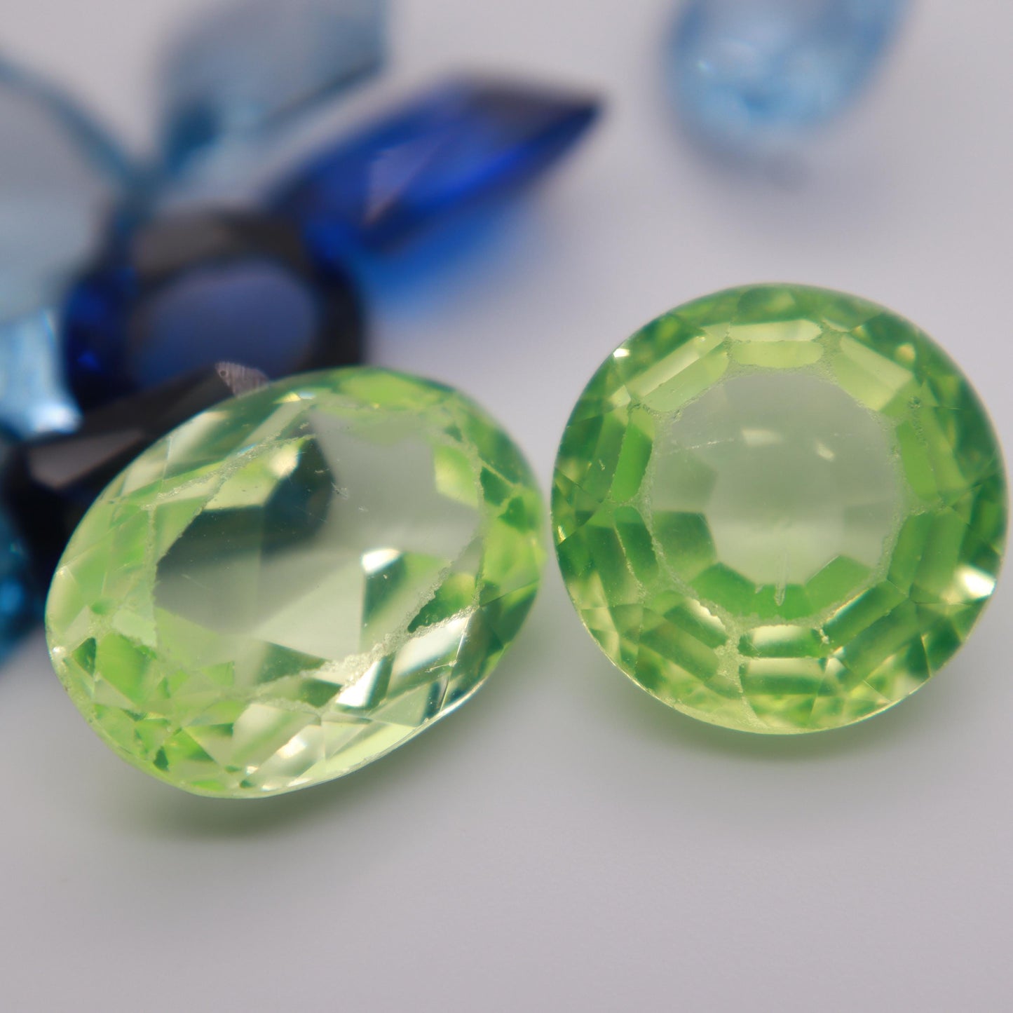 106 carat Lot of Lab Created Spinel 11 stones, Discounted Worn, Faceted, Recycled, Chipped, Damaged Gemstones, Blue and Yellow-Green