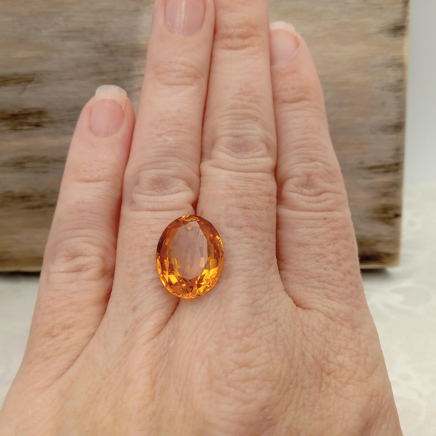 15.9mm x 12.2mm Oval Orange Yellow Synthetic Sapphire, 11.49 carat, Faceted Loose Gemstone