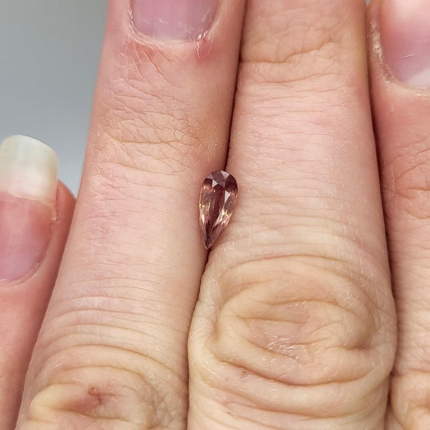 0.57 carat Natural Orangey Pink Sapphire 7.5x3.4mm, Pear Cut, Heated With Residues, Faceted Loose Gemstone, Earth Mined