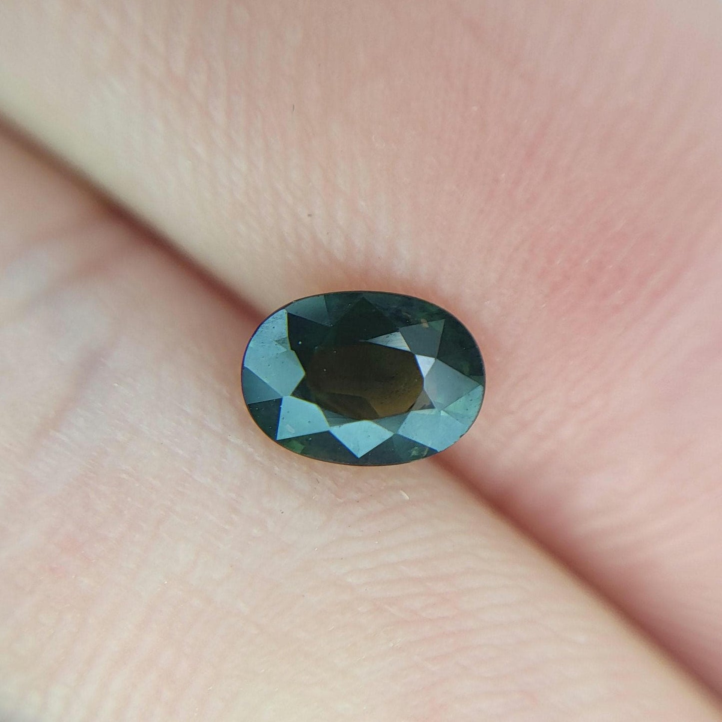 0.72 Carat Dark Green Sapphire 6.3x4.5mm Oval Cut, Faceted Loose Natural Heated Sapphire