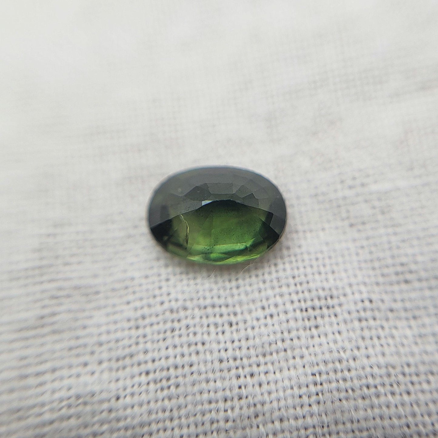 0.72 Carat Dark Green Sapphire 6.3x4.5mm Oval Cut, Faceted Loose Natural Heated Sapphire
