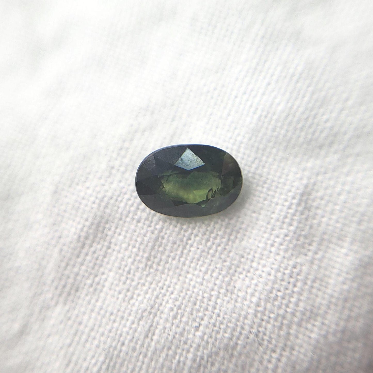 0.72 Carat Dark Green Sapphire 6.3x4.5mm Oval Cut, Faceted Loose Natural Heated Sapphire