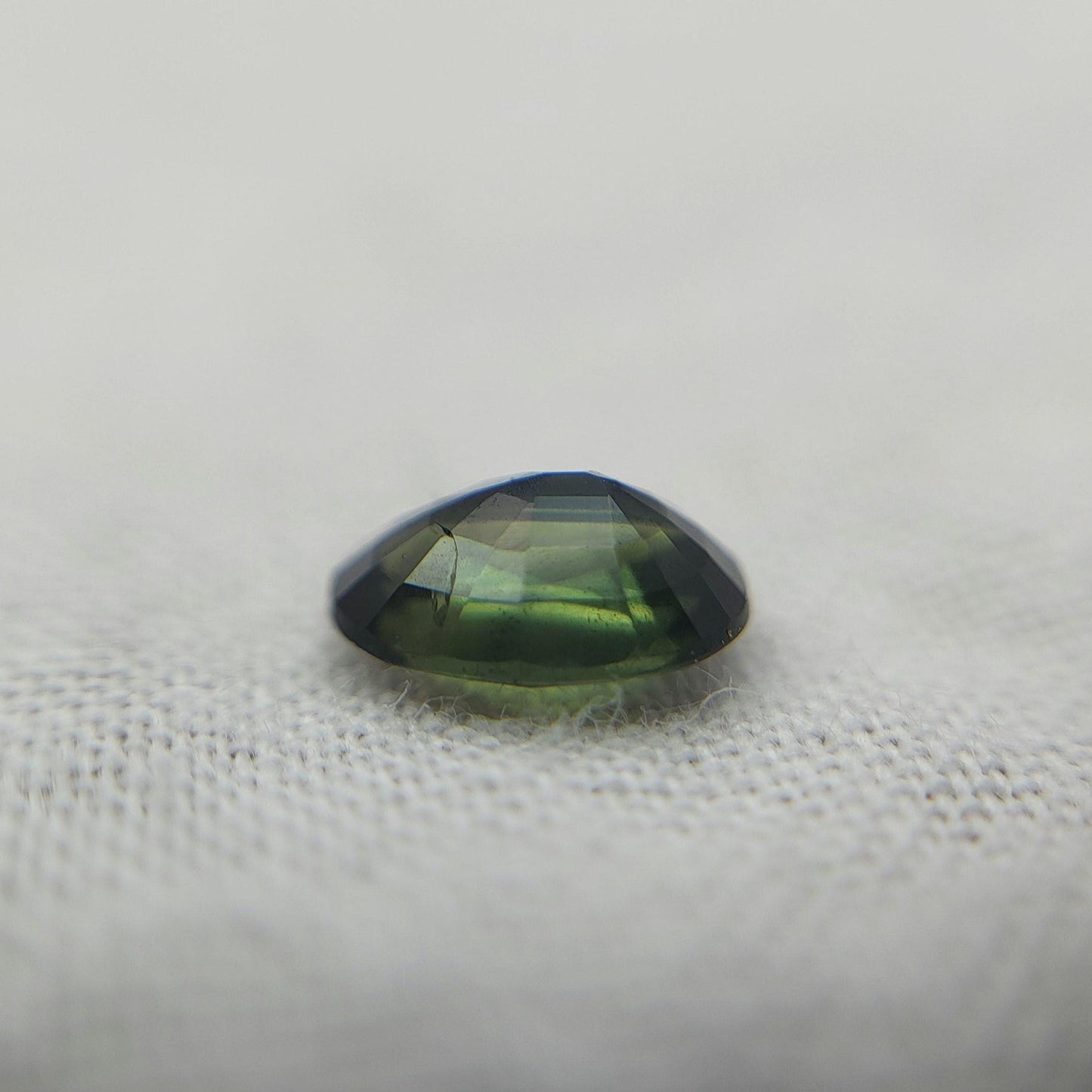 0.72 Carat Dark Green Sapphire 6.3x4.5mm Oval Cut, Faceted Loose Natural Heated Sapphire