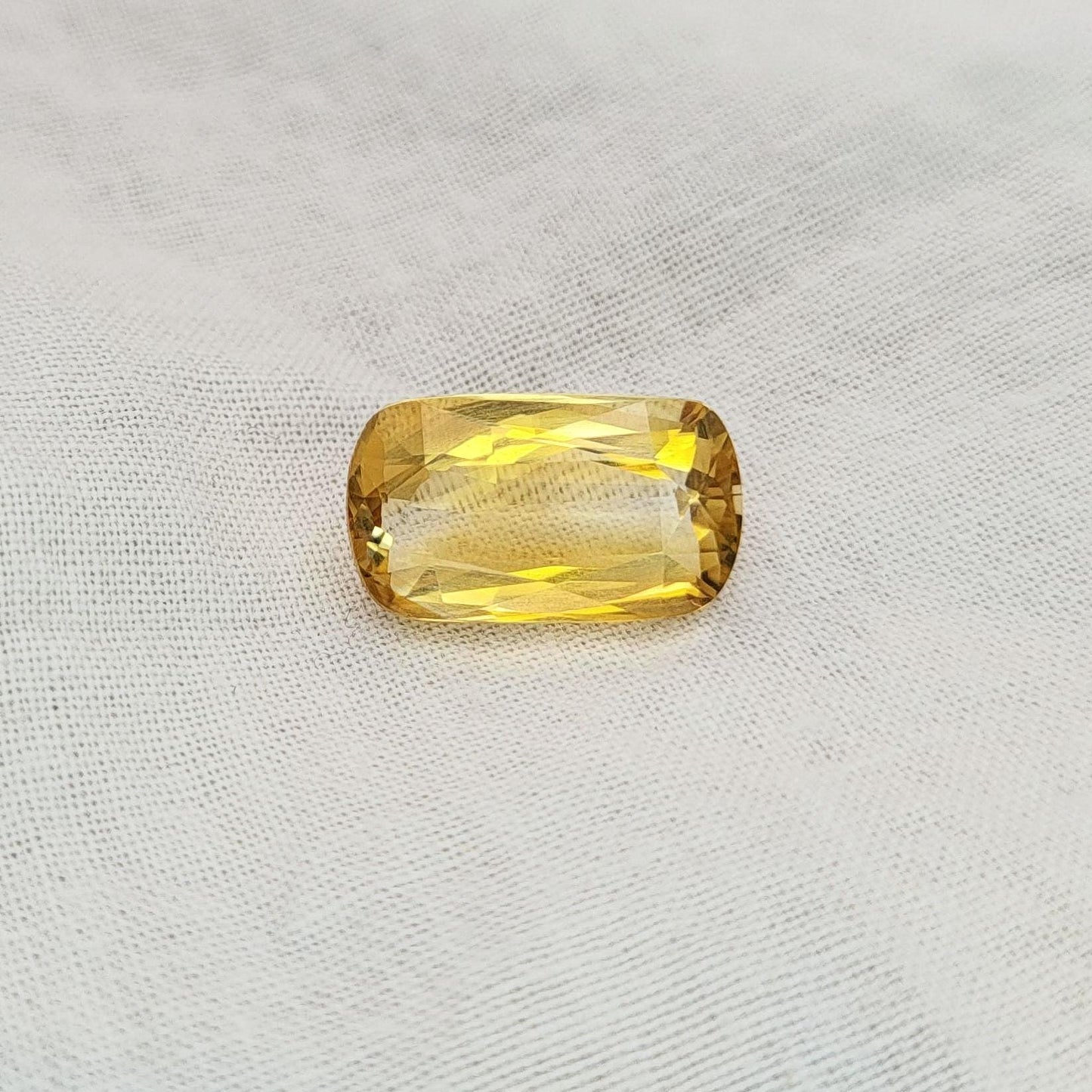 5.52 Carat Yellow-Orange Citrine 14.3x8.3mm long Cushion Cut, November Birthstone