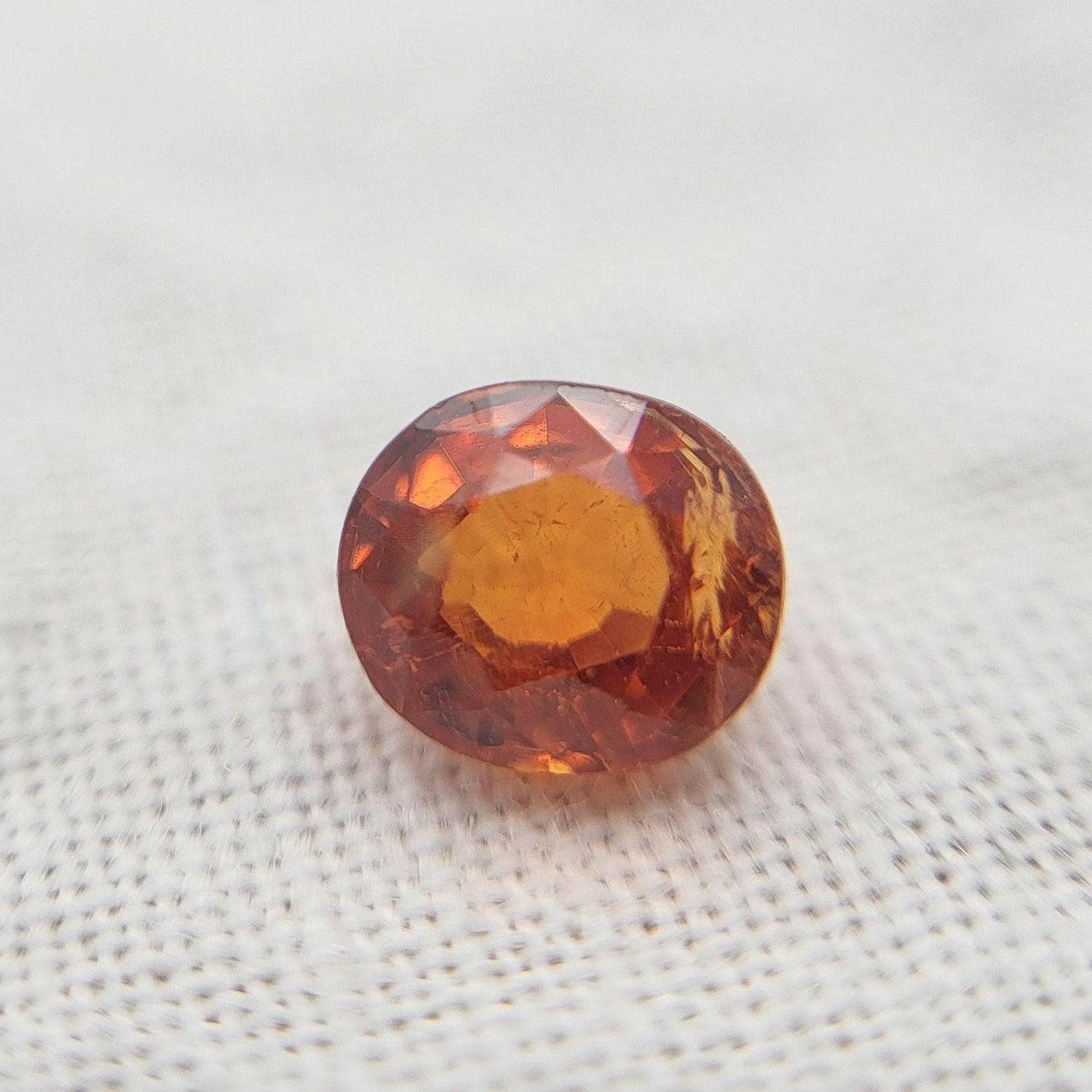 0.62 carat 5x4.3mm Natural Mandarin Spessartite Garnet, Faceted Oval Gemstone, Orange Garnet
