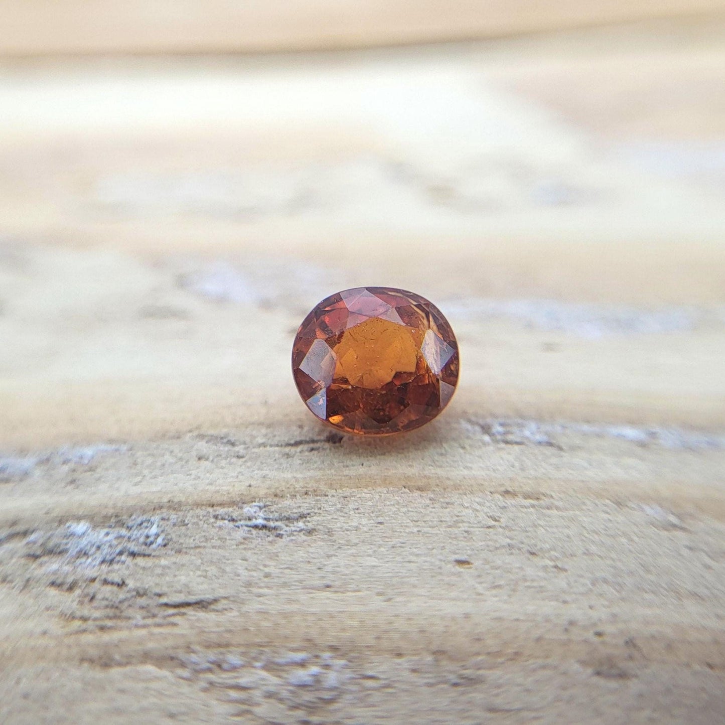 0.62 carat 5x4.3mm Natural Mandarin Spessartite Garnet, Faceted Oval Gemstone, Orange Garnet