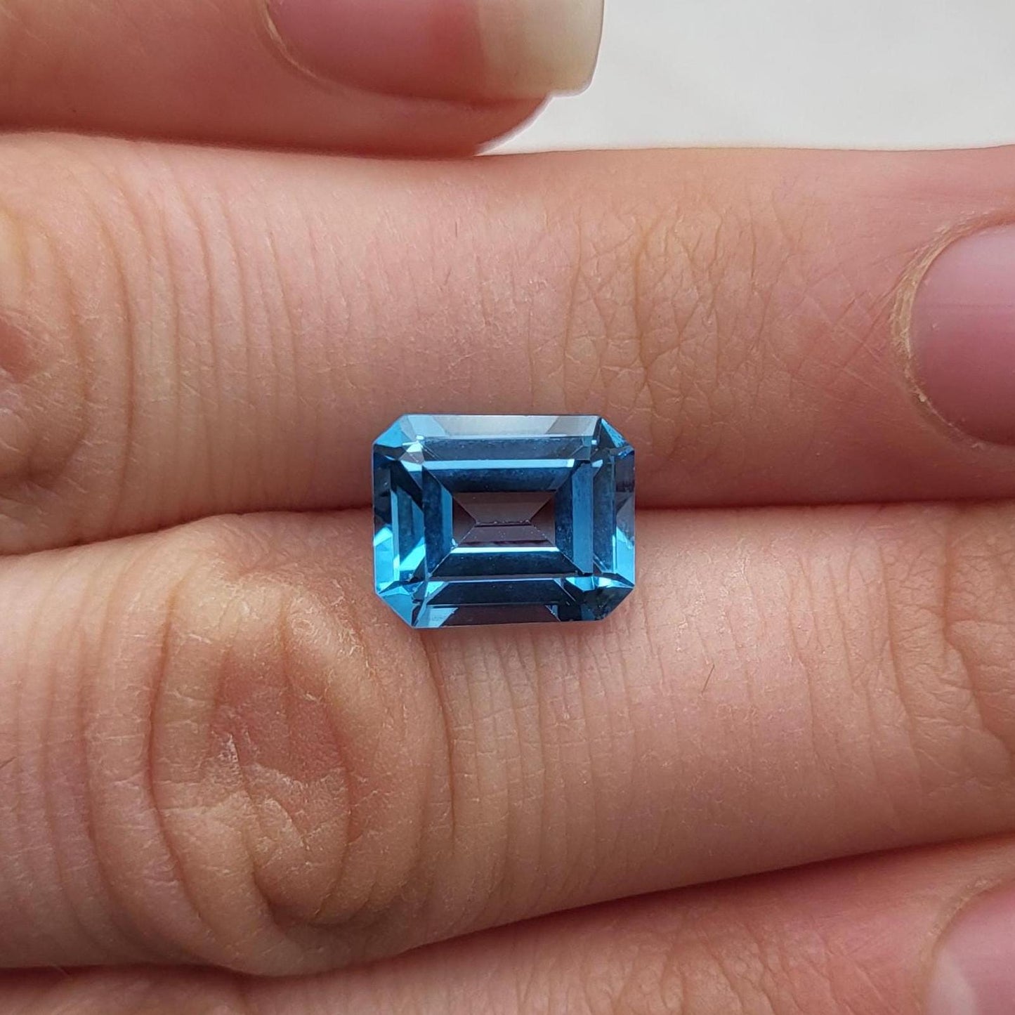 10x8mm Blue Topaz, 3.87 ct Emerald Cut Faceted Gemstone