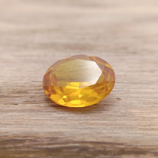 12x10mm Orangey Yellow Lab Sapphire 5.38 Carat Oval Cut, Faceted Loose Synthetic Corundum