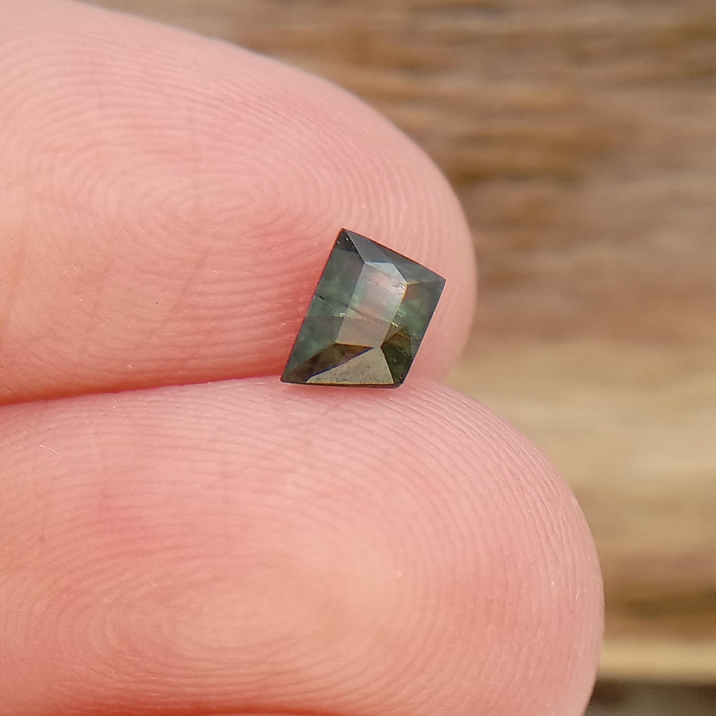 Fancy cut .53 Ct Natural Bluish Green Sapphire 3.4x3.7mm