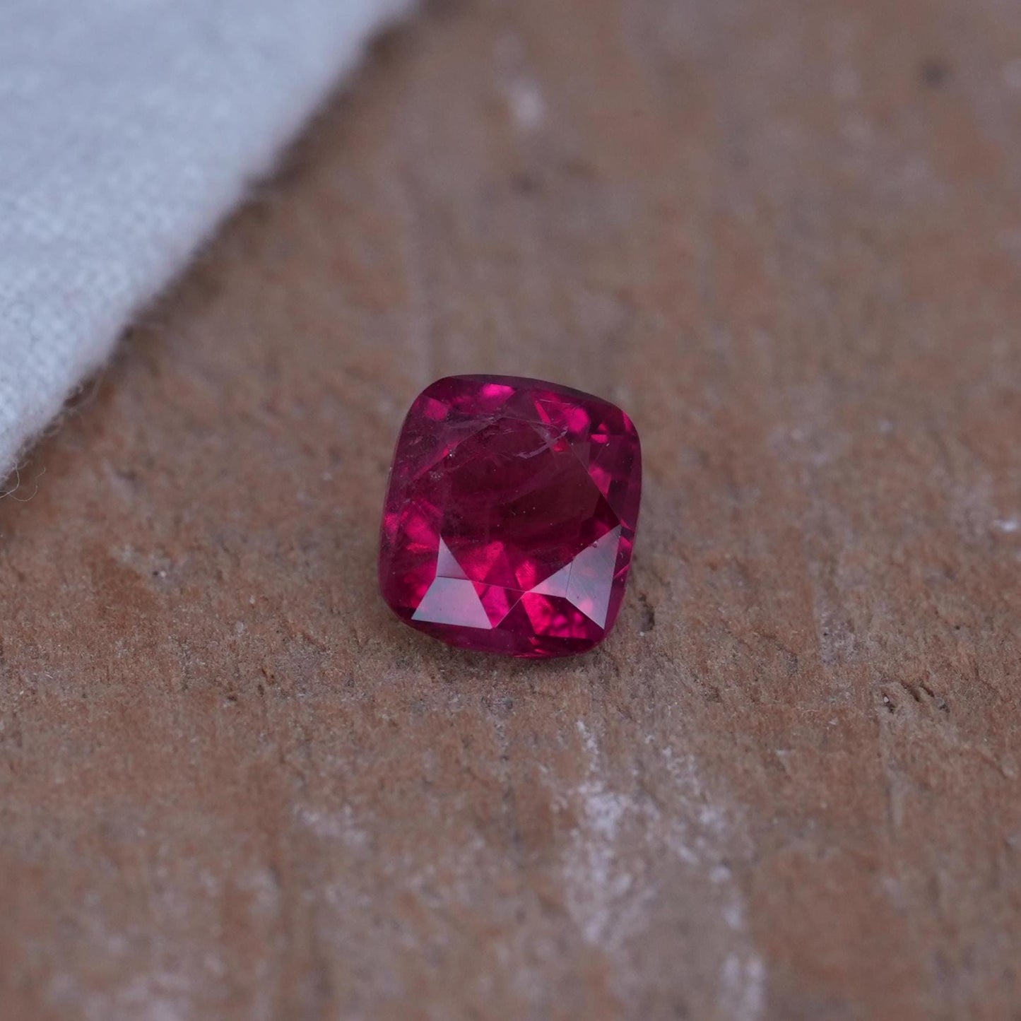 GIA 0.67 carat Red Beryl 5.8x5.2mm Cushion Cut, Natural Utah Bixbite