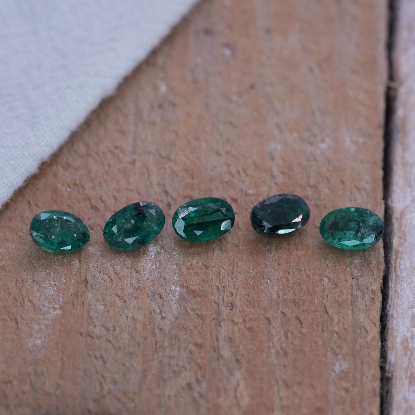 ONE- 6x4mm Emerald with Black Crystal Inclusions, Oval Cut