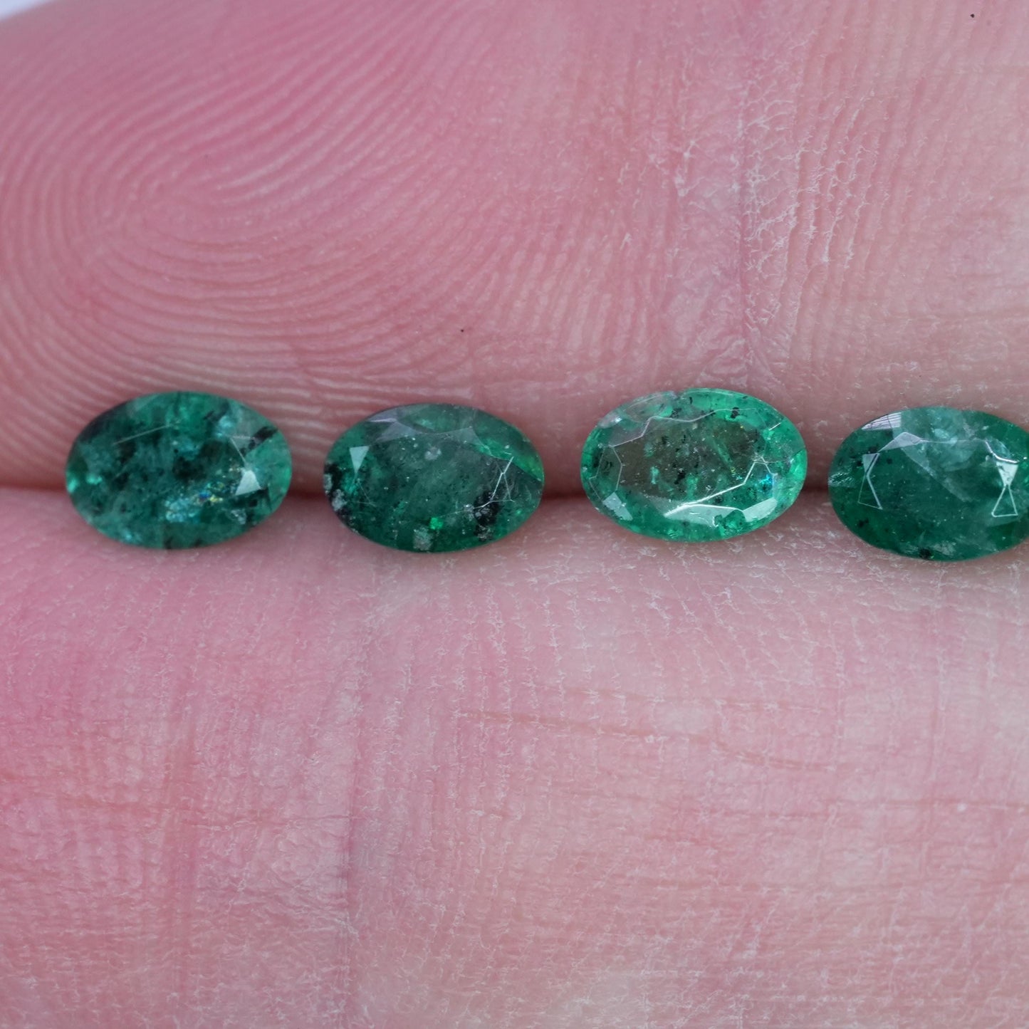 ONE- 6x4mm Emerald with Black Crystal Inclusions, Oval Cut