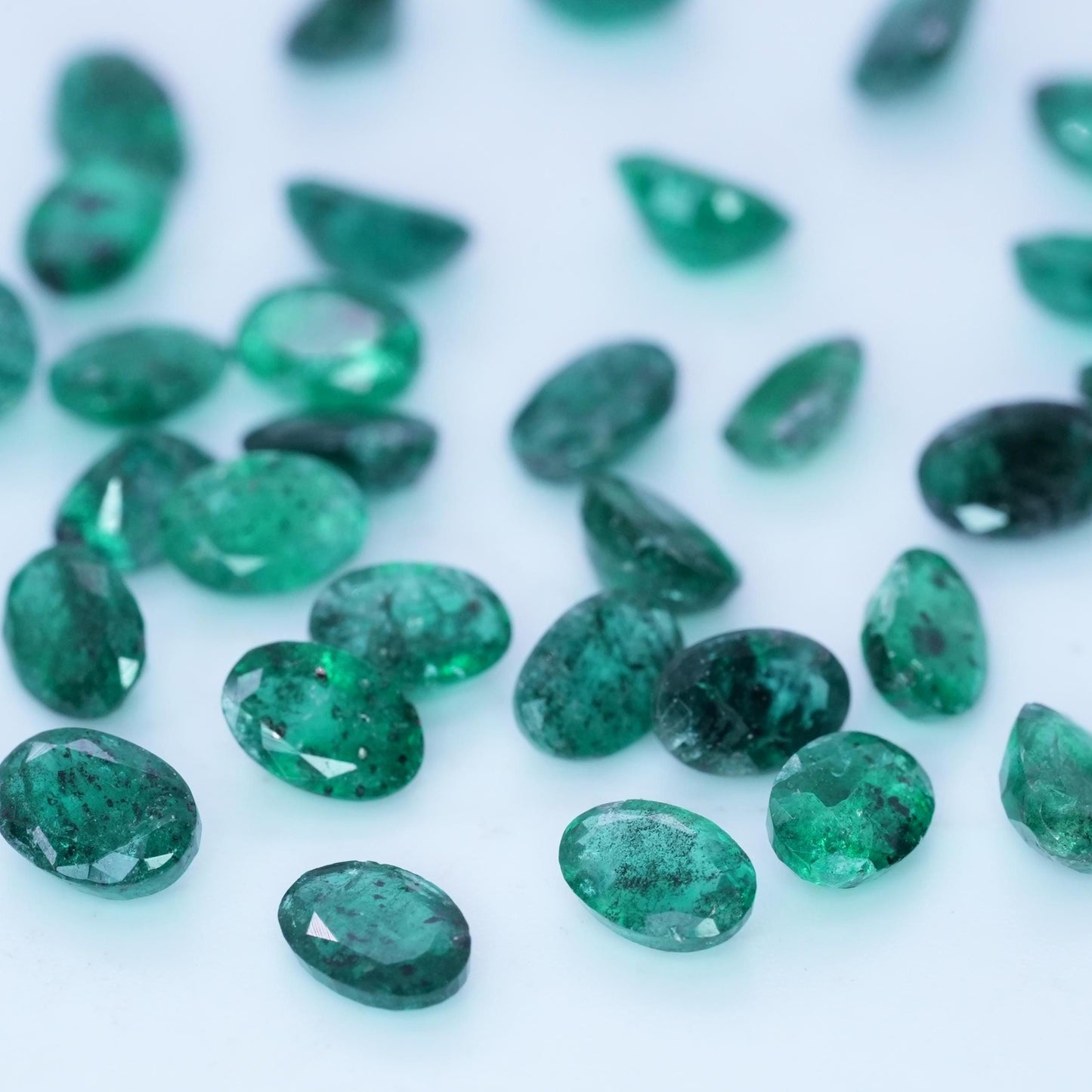 ONE- 6x4mm Emerald with Black Crystal Inclusions, Oval Cut