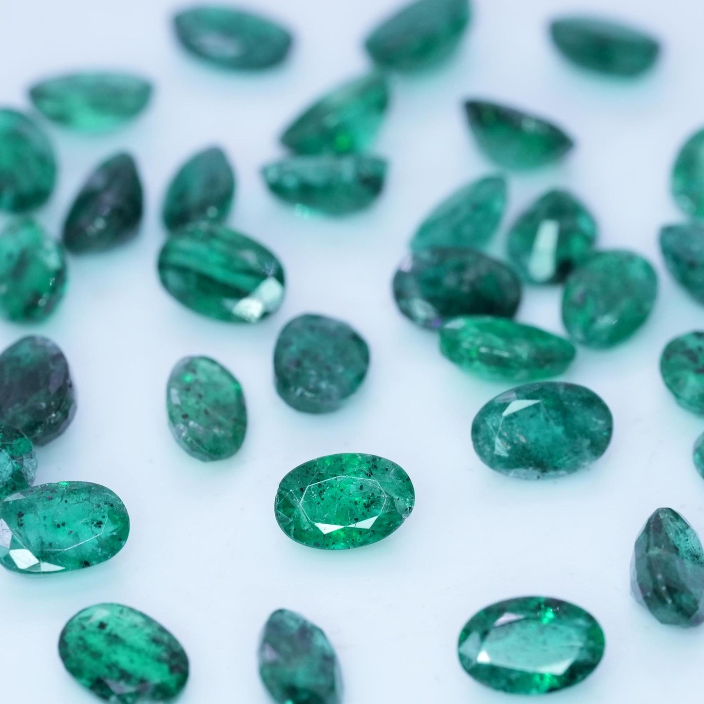 ONE- 6x4mm Emerald with Black Crystal Inclusions, Oval Cut