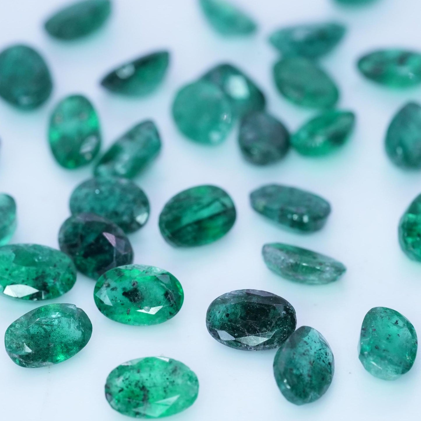 ONE- 6x4mm Emerald with Black Crystal Inclusions, Oval Cut