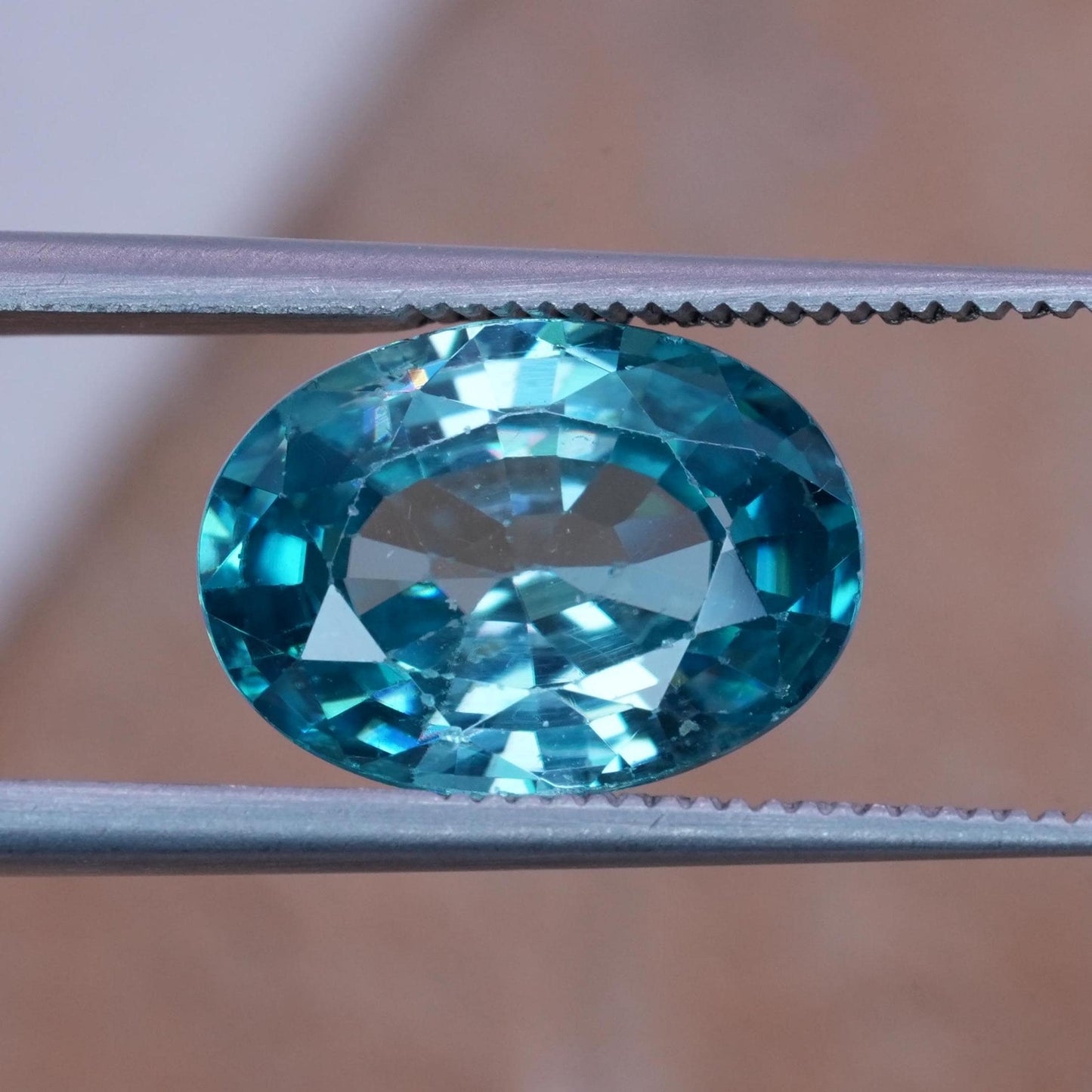 4.81 carat Blue Zircon 11.6x8.45mm Oval Cut