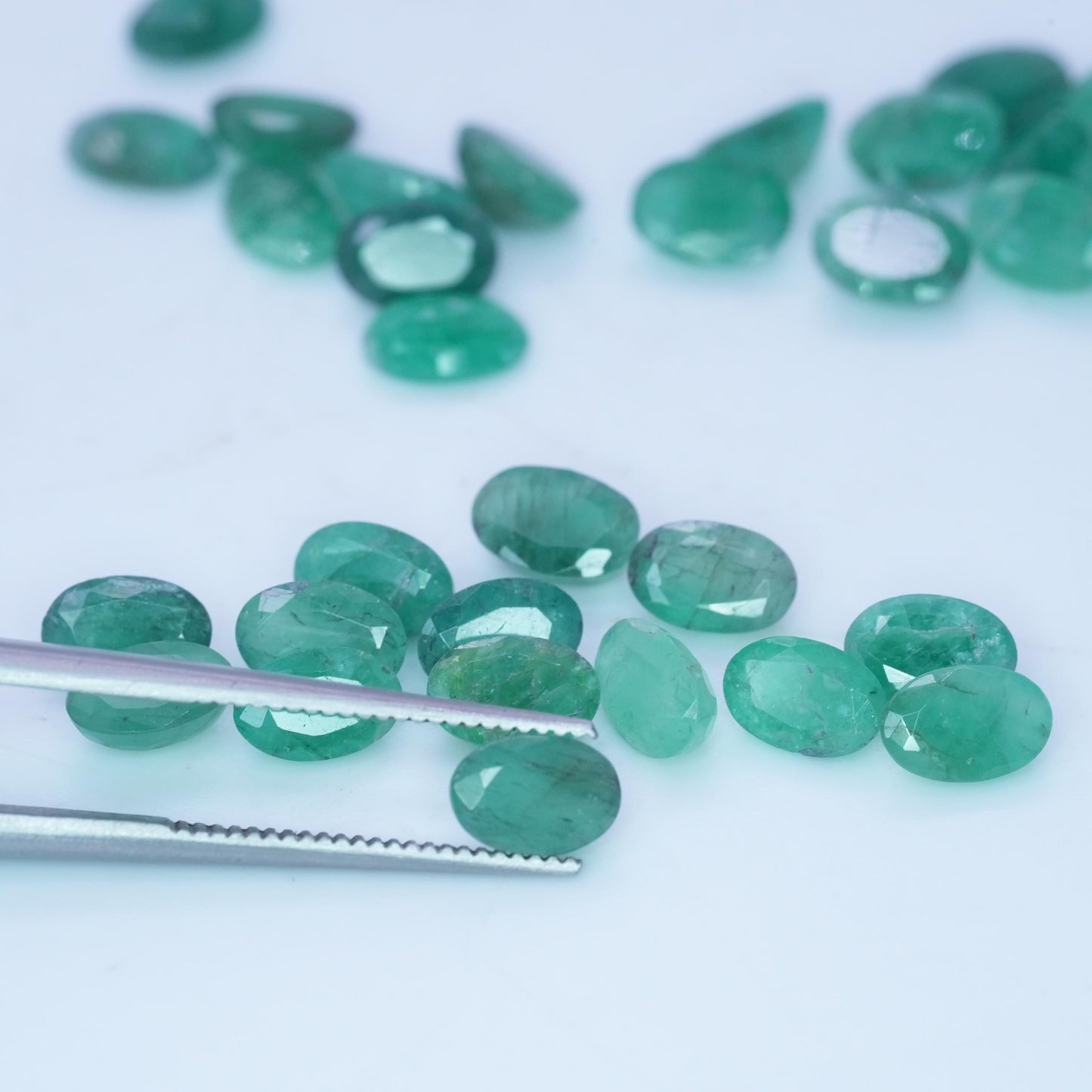 ONE- 6x4mm Cloudy Emerald Oval Cut