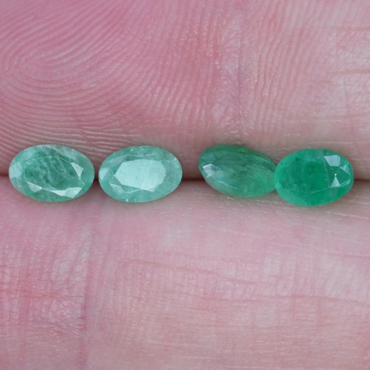 ONE- 6x4mm Cloudy Emerald Oval Cut