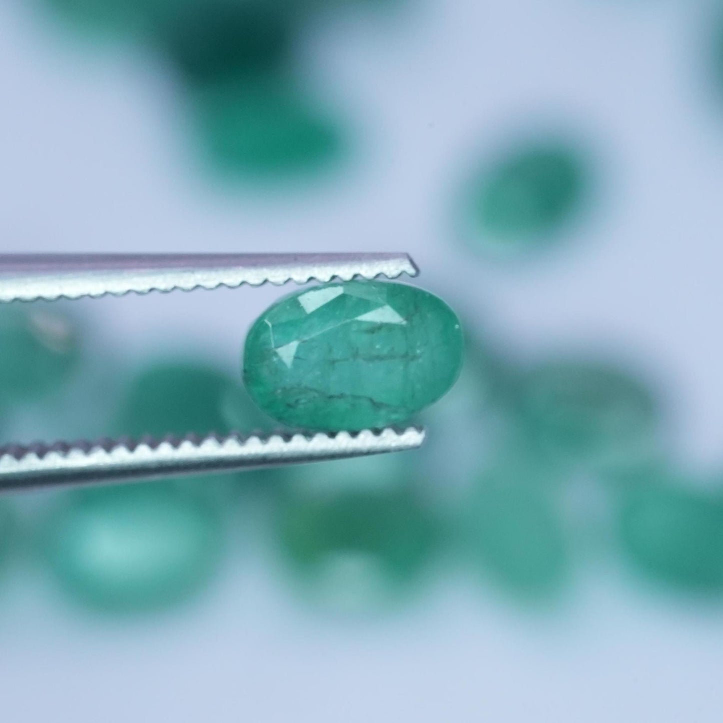ONE- 6x4mm Cloudy Emerald Oval Cut