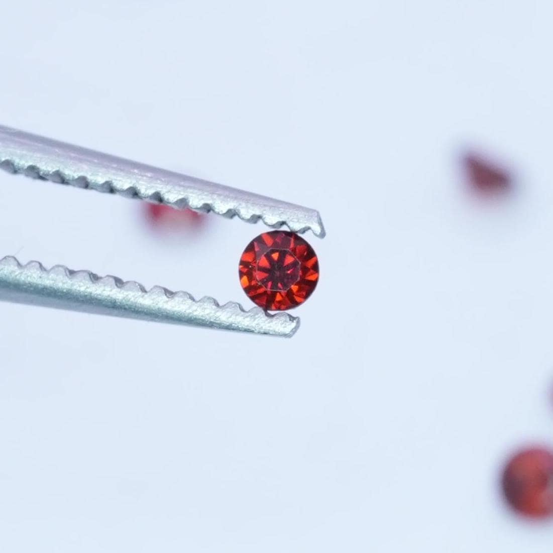 ONE 2mm Red Garnet Round Cut