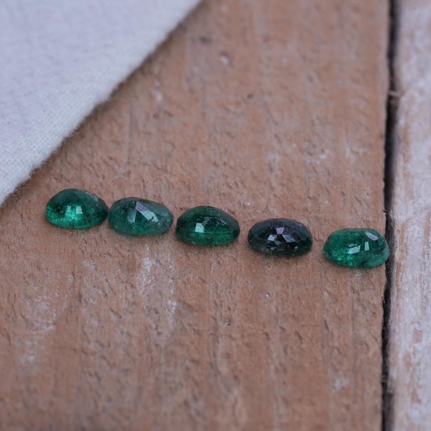 ONE- 6x4mm Emerald with Black Crystal Inclusions, Oval Cut