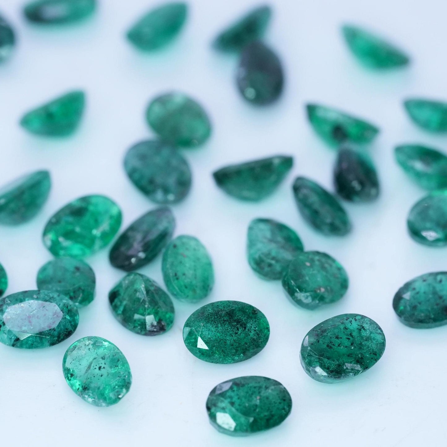 ONE- 6x4mm Emerald with Black Crystal Inclusions, Oval Cut