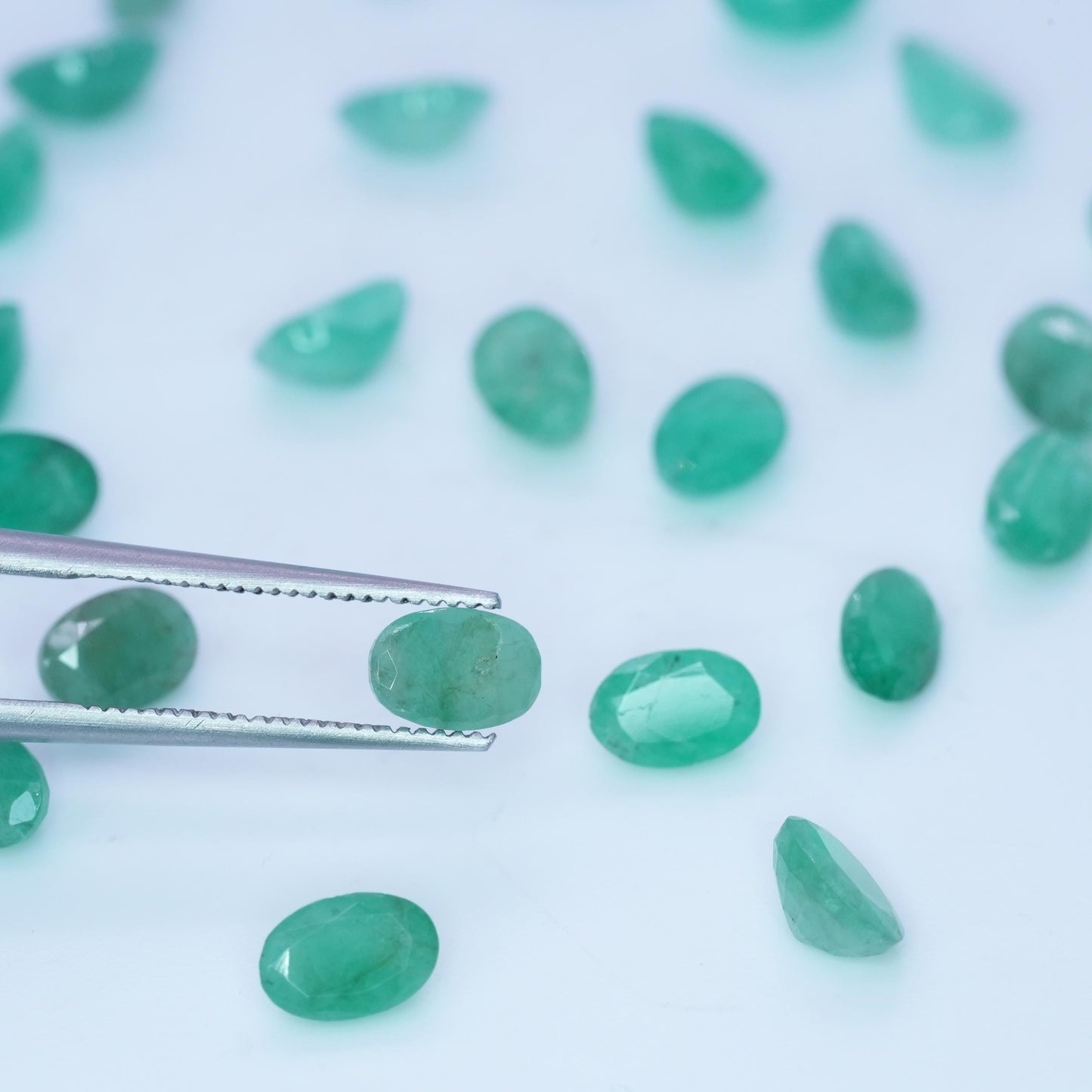 ONE- 6x4mm Cloudy Emerald Oval Cut