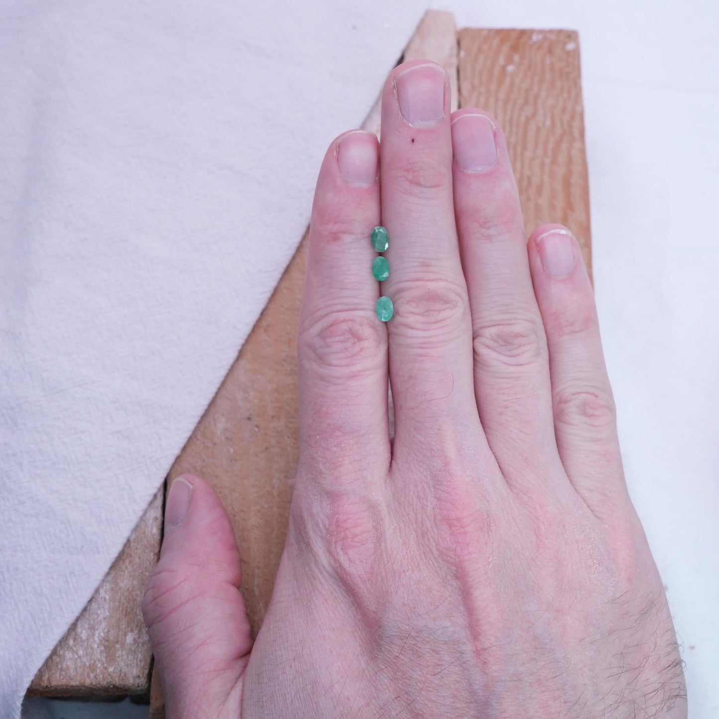 ONE- 6x4mm Cloudy Emerald Oval Cut