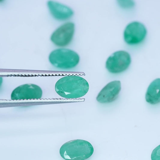 ONE- 6x4mm Cloudy Emerald Oval Cut