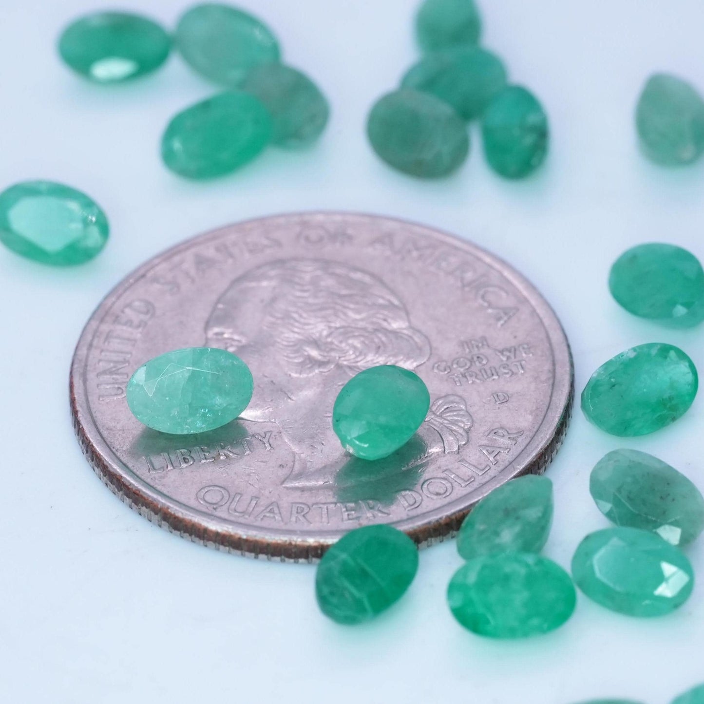 ONE- 6x4mm Cloudy Emerald Oval Cut