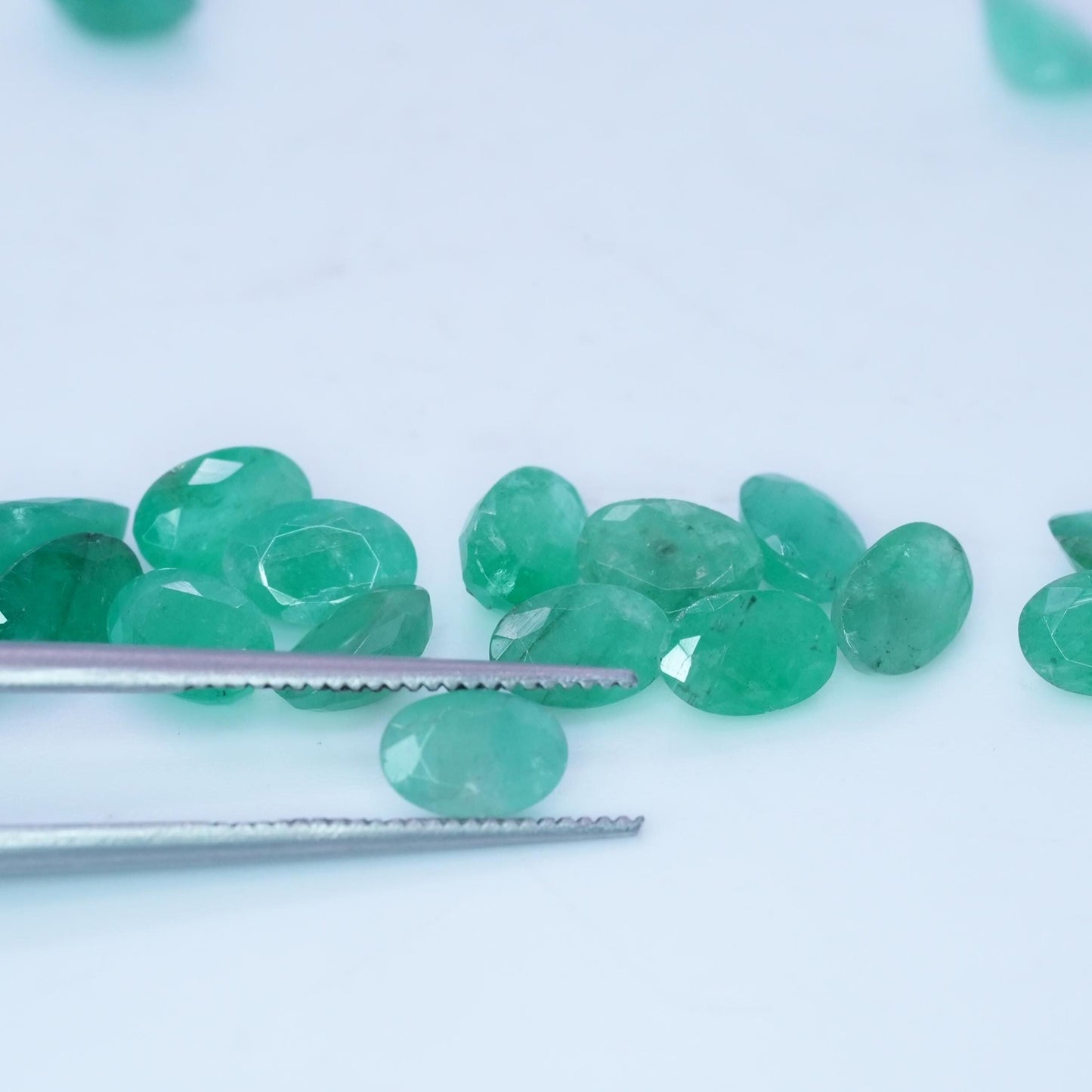 ONE- 6x4mm Cloudy Emerald Oval Cut