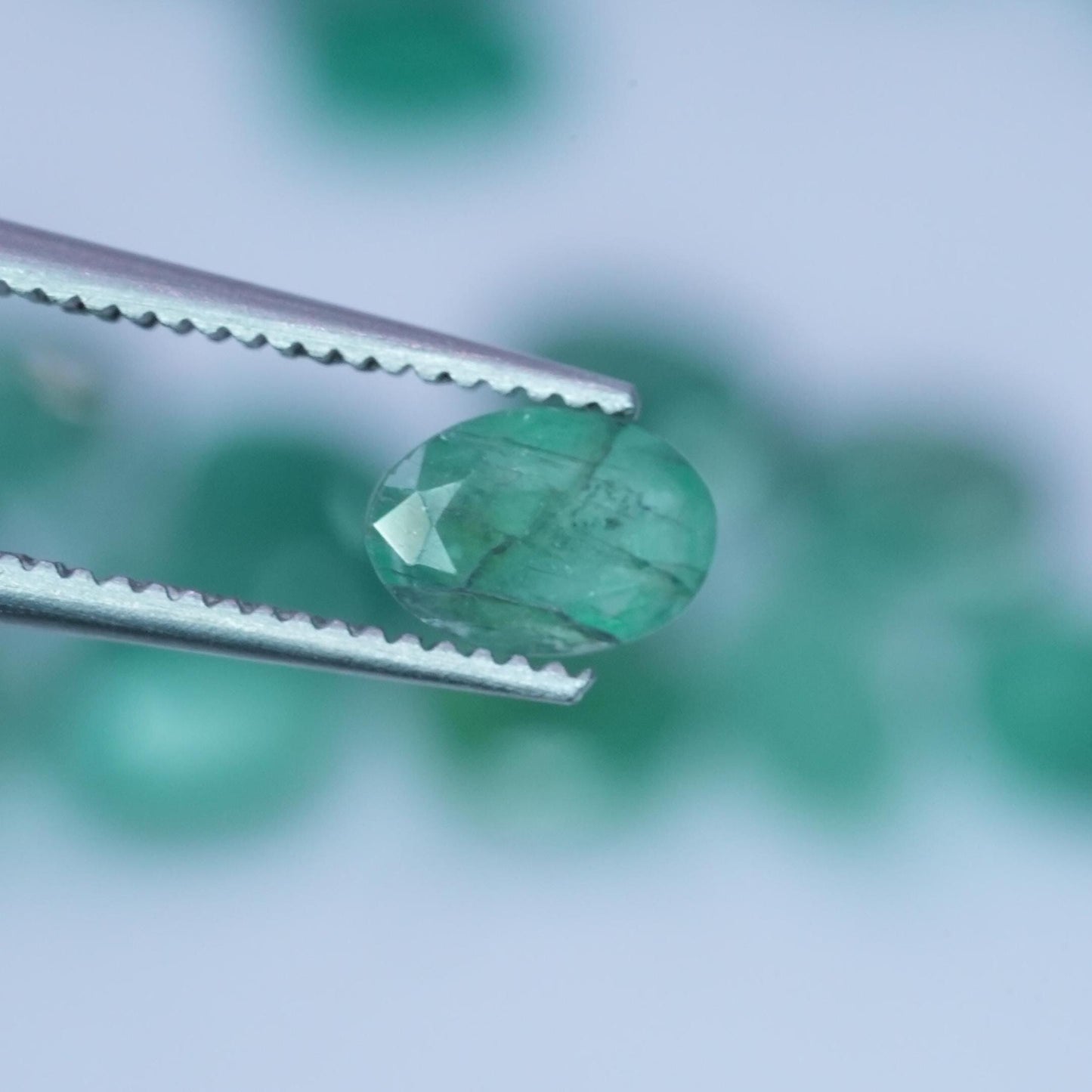 ONE- 6x4mm Cloudy Emerald Oval Cut