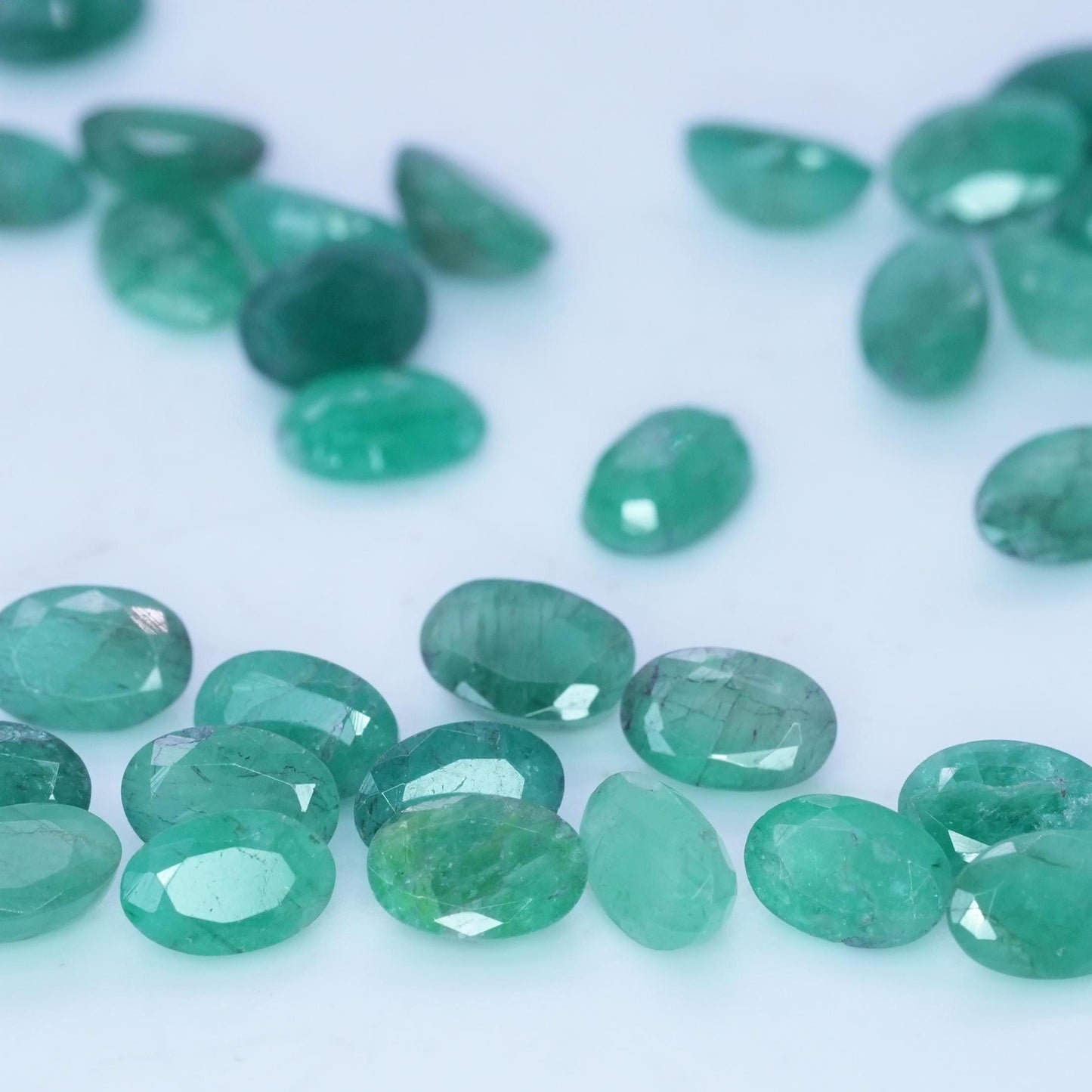 ONE- 6x4mm Cloudy Emerald Oval Cut