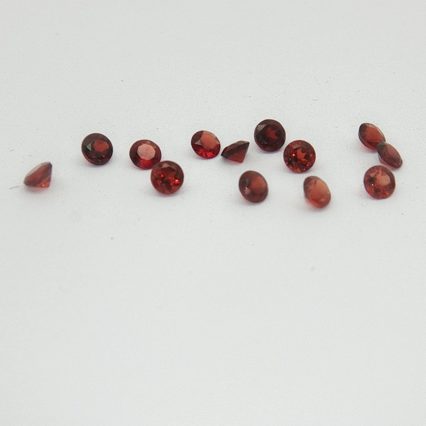 ONE 2mm Red Garnet Round Cut
